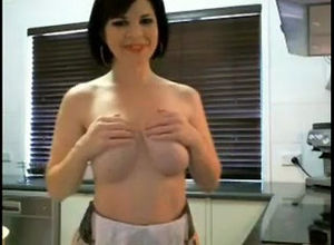 Huge-titted Cougar bare on a kitchen